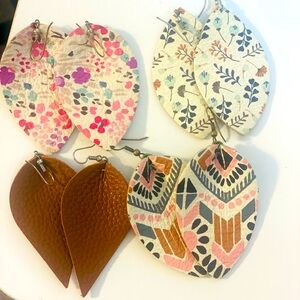 Four pairs of leather earrings. Used but excellent condition.